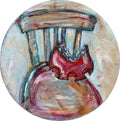 Painted depiction of a red chair with a white background